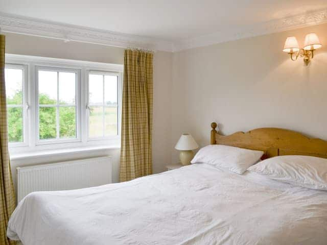 Peaceful double bedroom | Walnut Tree House, Tilney St Lawrence, near Kings Lynn