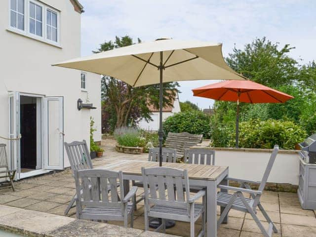 Paved patio area with outdoor area | Walnut Tree House, Tilney St Lawrence, near Kings Lynn