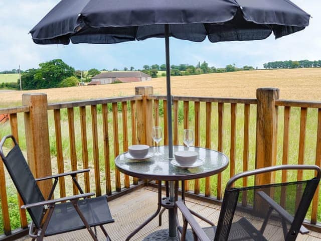 Delightful sitting out area with countryside views | The Cart Shed - Swafield Barns, Swafield, near North Walsham