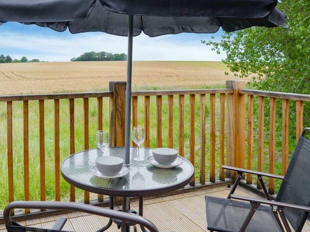 Delightful sitting out area with countryside views | The Cart Shed - Swafield Barns, Swafield, near North Walsham