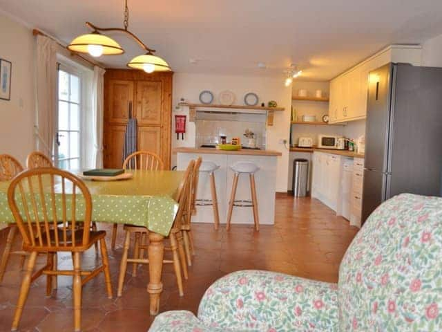 The day room, kitchen and dining area on the lower ground floor | Roadstead, Fowey