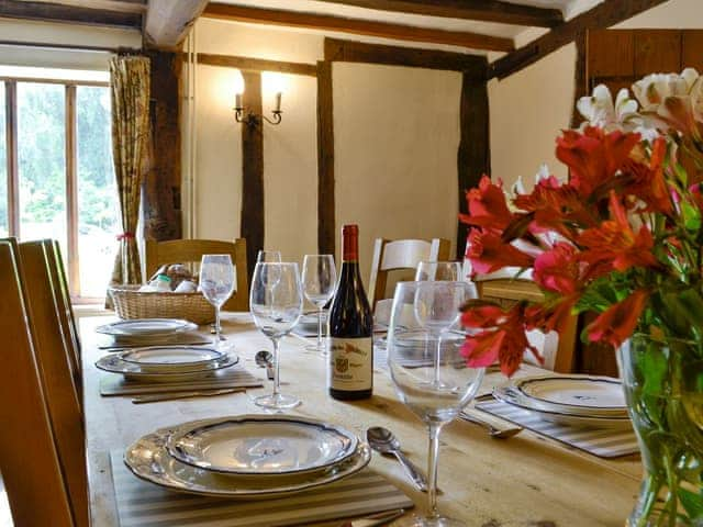 Charming dining room with exposed wooden beams | Meadow Cottage, Linstead Parva, near Southwold