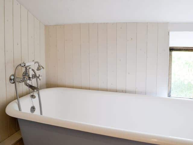 Roll-top bath with shower attachment | Meadow Cottage, Linstead Parva, near Southwold