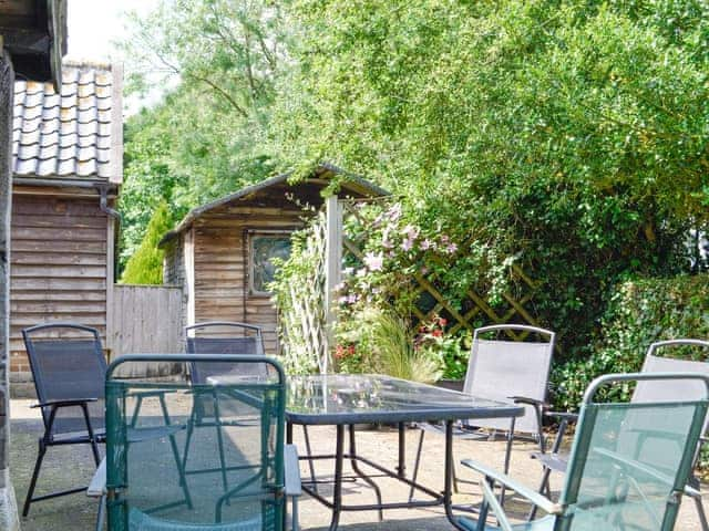 Patio area with outdoor furniture | Meadow Cottage, Linstead Parva, near Southwold