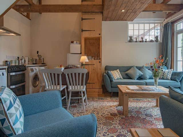 Welcoming open-plan living space | The Coach House Stables, Hernhill