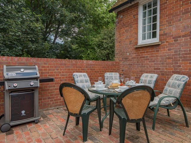 Patio and BBQ area | The Coach House Stables, Hernhill