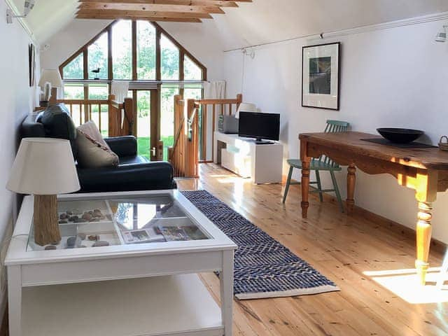 Living area with exposed woodwork | The Studio, Hoe, near Dereham