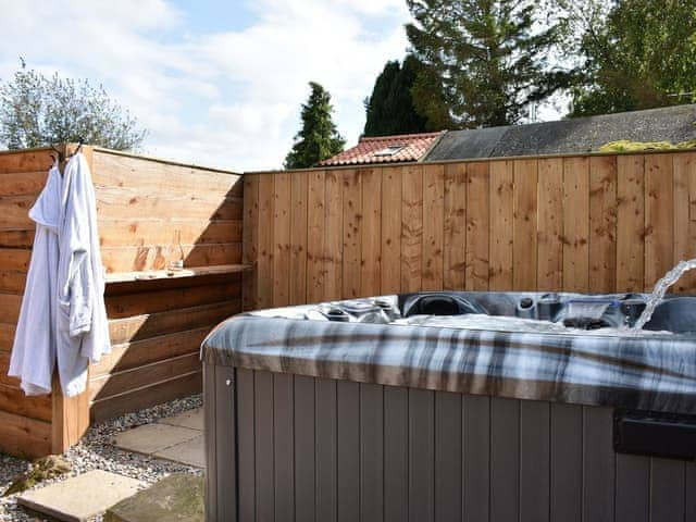 Relax in the luxurious hot tub | Poppy Lodge - Tavern Cottages, Newsham, near Richmond