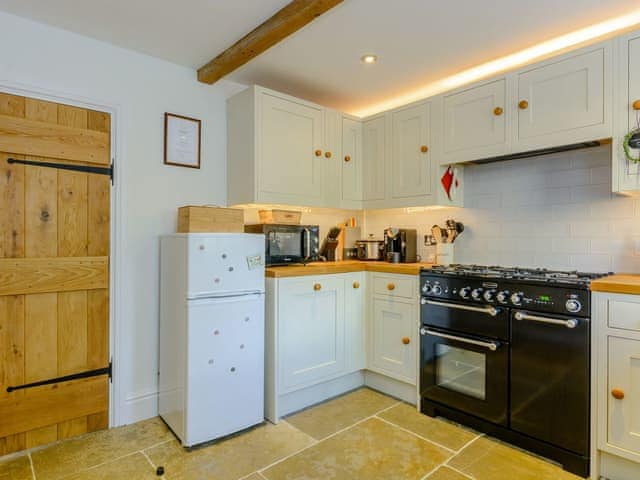 Well-equipped fitted kitchen | Whibberley Cottage, Ashford-in-the-Water, near Bakewell