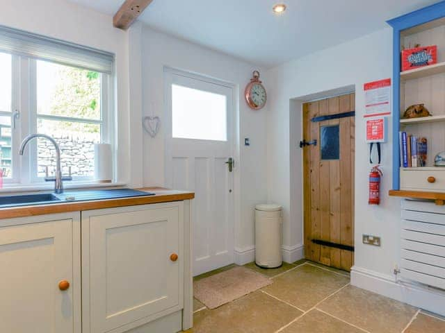 Kitchen with access to rear garden | Whibberley Cottage, Ashford-in-the-Water, near Bakewell