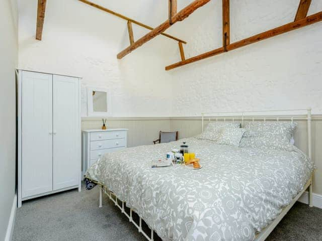 Romantic double bedroom with super kingsize bed | The Stables - Kingates Farm, Whitwell, near Ventnor