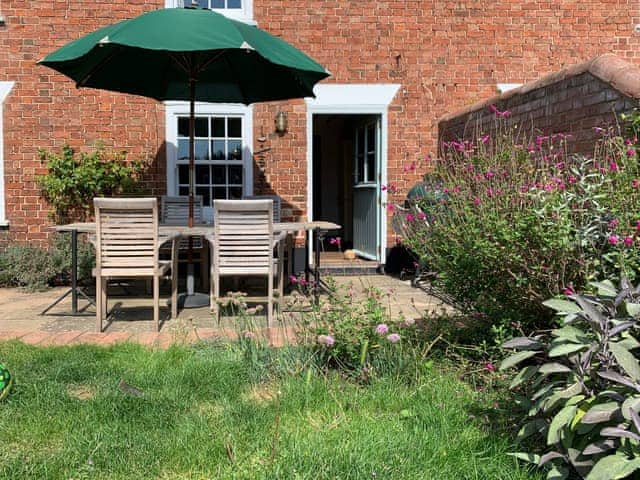 Front garden and patio area | Coastguard&rsquo;s Cottage, Burnham Overy Staithe, near Burnham Market