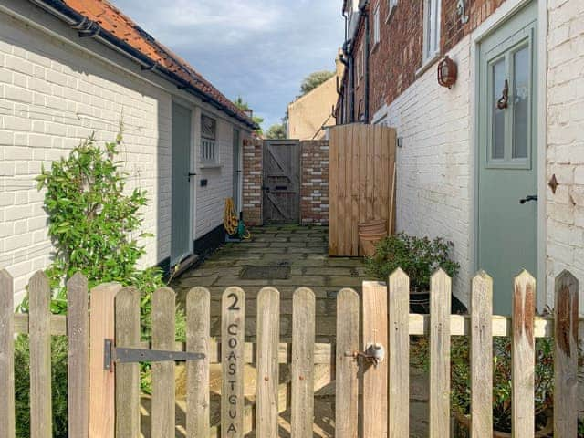 Rear courtyard with converted outhouse | Coastguard&rsquo;s Cottage, Burnham Overy Staithe, near Burnham Market