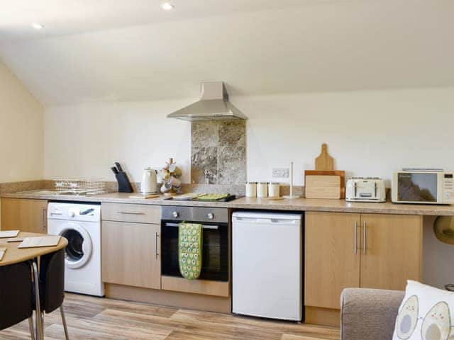 Well equipped kitchen/ dining area | Copperfield Lodge, Sandown