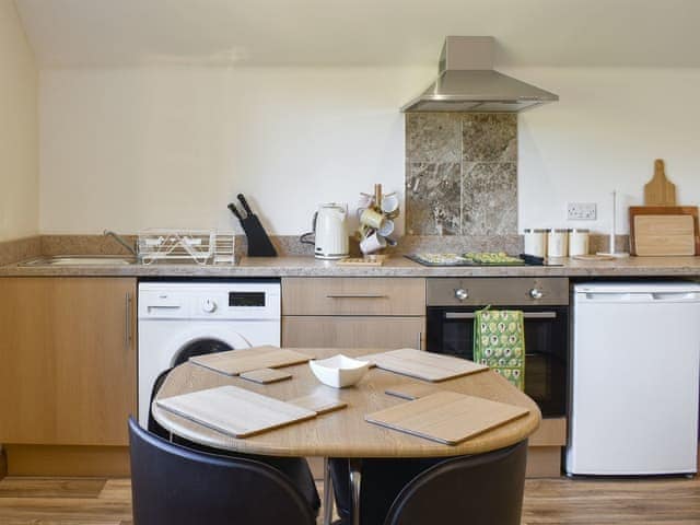 Well equipped kitchen/ dining area | Copperfield Lodge, Sandown