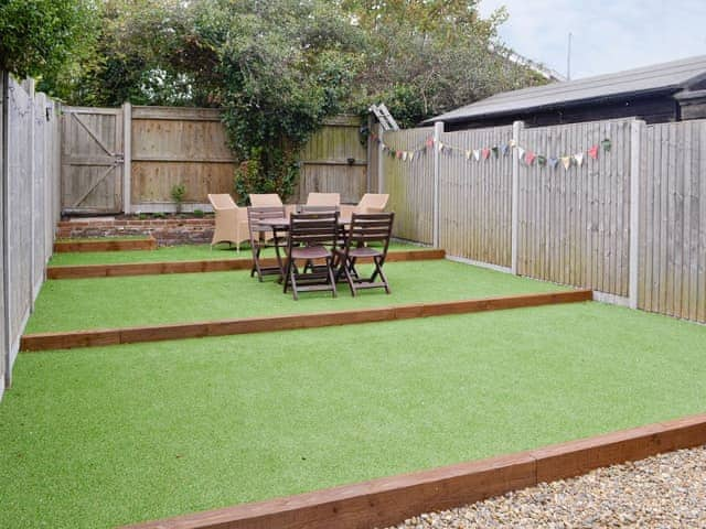 Enclosed patio/garden area with outdoor furniture | Cats Cottage, Kessingland, near Lowestoft