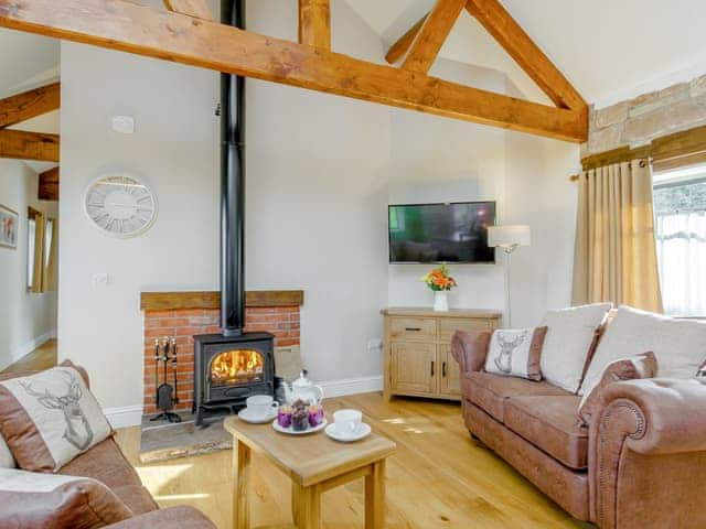 Delightful living area with wood burner | The Chicken Coop - Hewelsfield Court, Hewelsfield, near Lydney