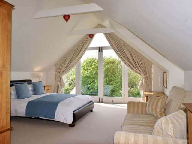 Master bedroom with king sized bed | Buddleia, West Charleton, near Kingsbridge