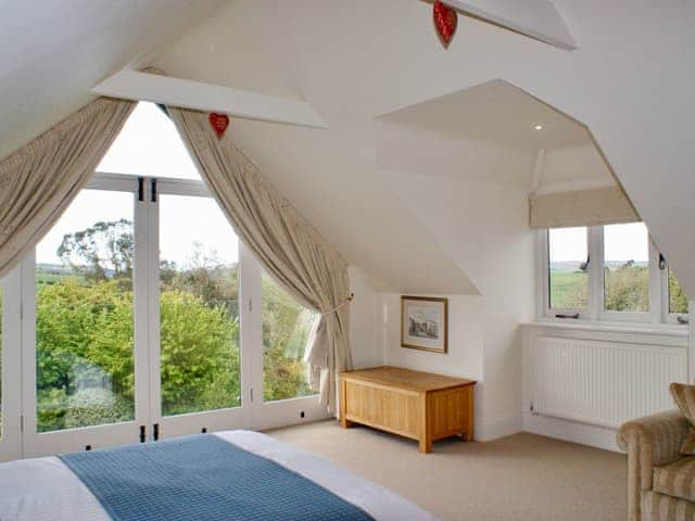 Master bedroom with king sized bed | Buddleia, West Charleton, near Kingsbridge