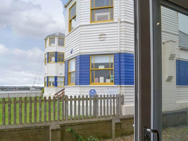 Patio door from living room overlooking the Lifeboat museum | The View Old Coastguard Cottage, Tynemouth