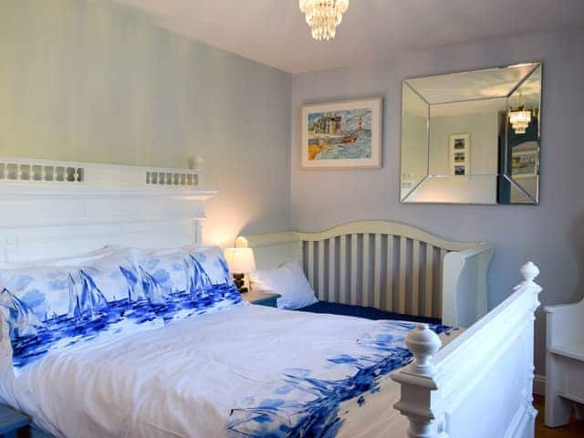 Comfomfortable double bedroom with additional single bed | Woodbrook Cottage, Bothenhampton, near Bridport