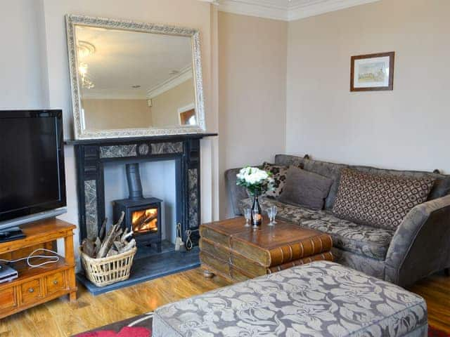 Welcoming living room with wood burner | The View Old Coastguard Cottage, Tynemouth