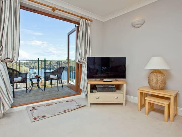 Light and airy living room with access to a balcony | Chyandour, Fowey