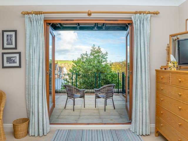 Access to a balcony from the twin bedroom | Chyandour, Fowey