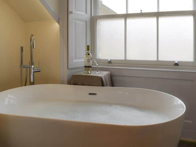 Bathroom with stand-alone bath | The Haven, Holy Island, near Berwick-upon-Tweed