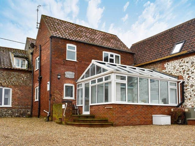 Comfortable conservatory to the rear | Dale View - Sea Marsh Cottages, Brancaster Staithe, near Wells-next-the-Sea