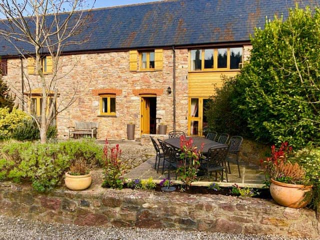 Courtyard garden with garden furniture and gas BBQ | Barn Owl - Newhouse Barton, Ipplepen, near Totnes