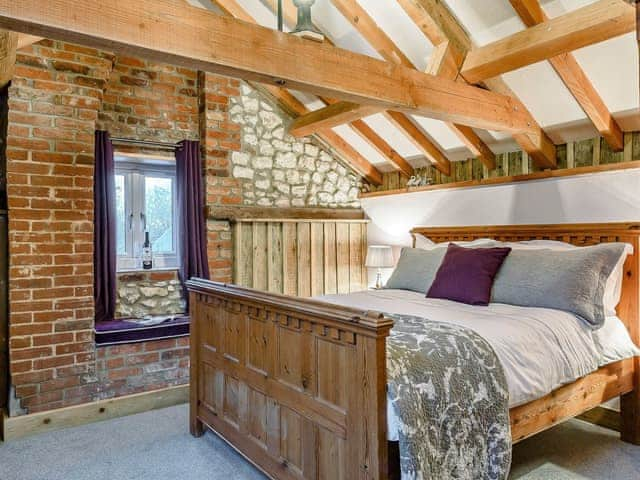 Relaxing double bedroom with beams | Honey Pots, Foulden, near Swaffham