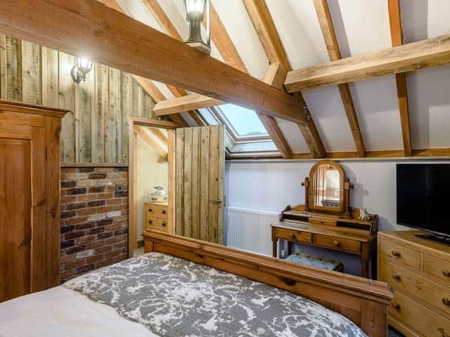 Relaxing double bedroom with beams | Honey Pots, Foulden, near Swaffham