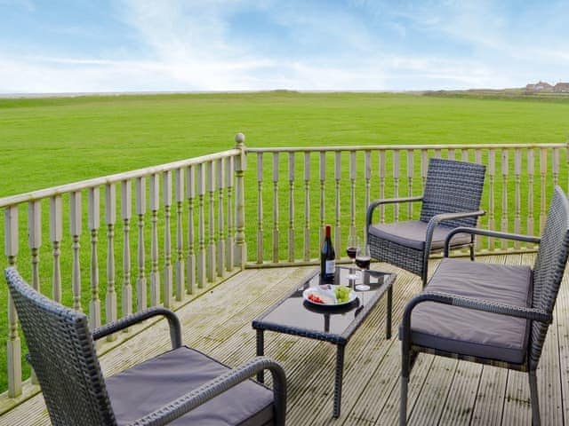 Relaxing decking area with sea views | Roses Place, Bacton