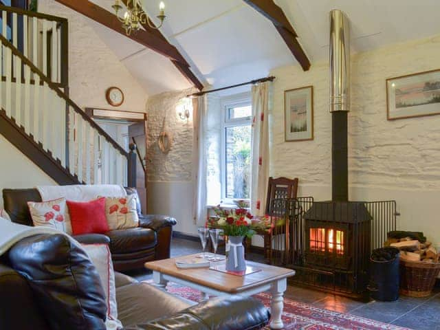 Living room with wood burner | Trenay Barn Cottage, St Neot, near Liskeard