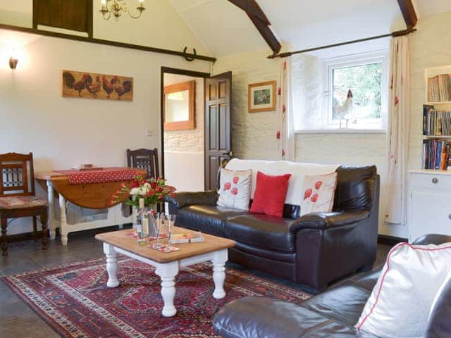 Comfortable living/dining room | Trenay Barn Cottage, St Neot, near Liskeard