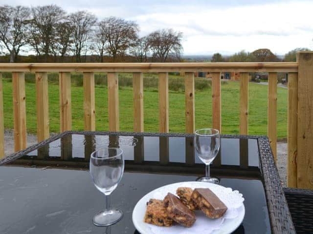 Sitting out area | Merlin&rsquo;s Cabin - Wallace Lane Farm Cottages, Brocklebank, near Caldbeck and Uldale