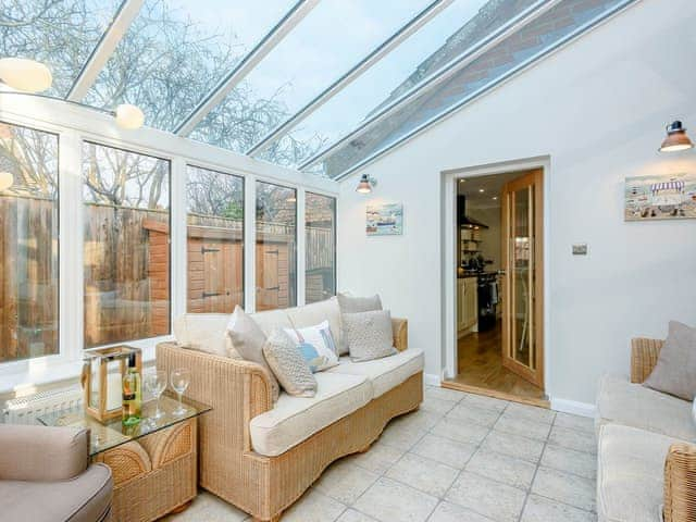 Relaxing conservatory | Corner House, East Runton