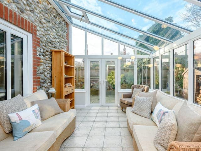 Relaxing conservatory | Corner House, East Runton