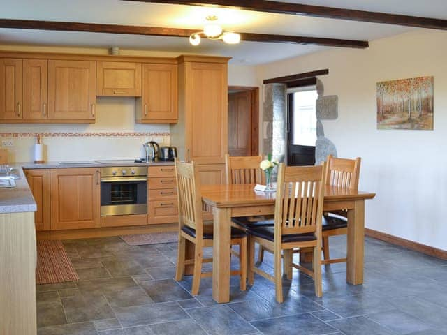 Kitchen/diner | Eglos Derry Farm Cottage - Burnuick Farm Cottages, Gunwalloe, near Helston