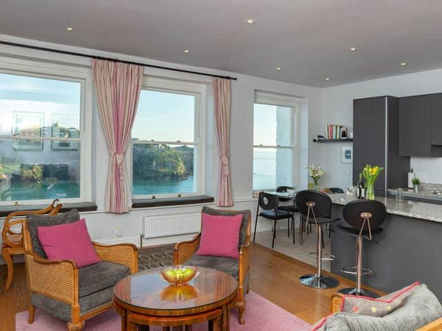 Modern kitchen area with dining table and chairs | St Catherines Court No 4, Fowey