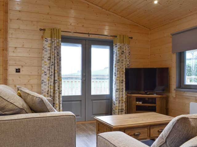 Welcoming living area | Cedar Lodge, Larch Lodge - Dale Garth Lodges, Mascalles, near Ulverston