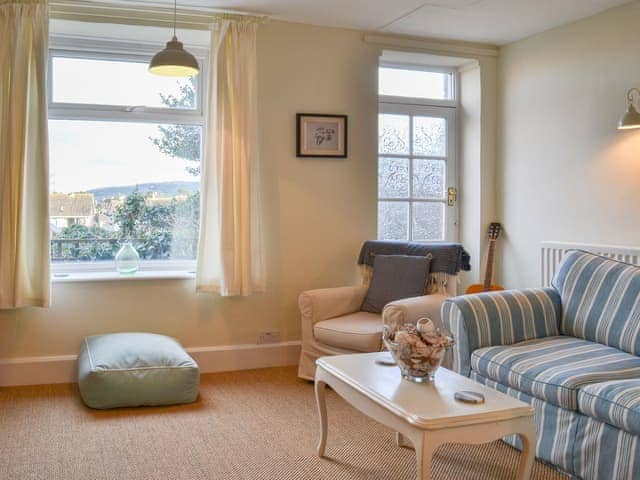 Spacious living room with comfortable furniture | Honeysuckle Cottage, Watchet