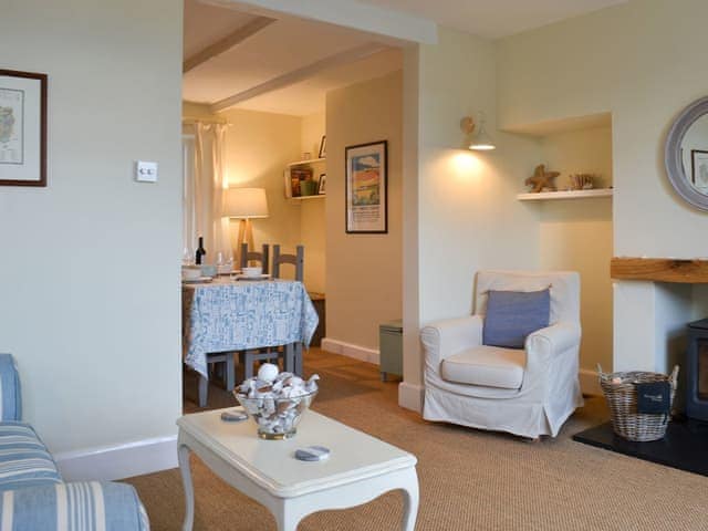 Lovely living room and through-dining room | Honeysuckle Cottage, Watchet