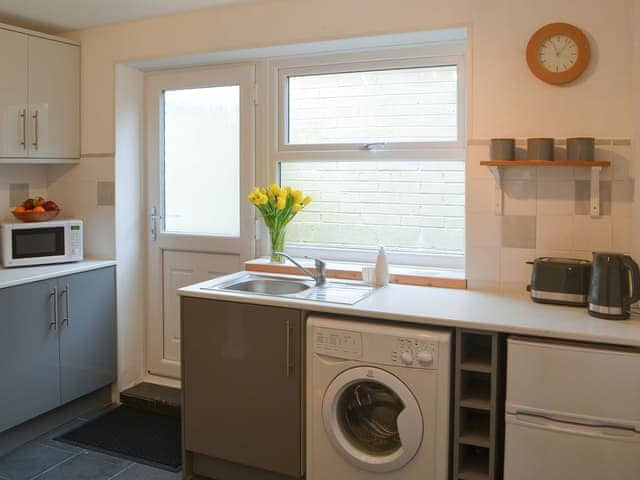 Well equipped kitchen with laundry facilities | Broughs House, North Broomhill, near Amble