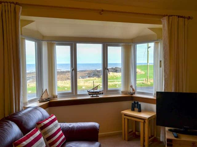 Panoramic sea views fom the living room | Dunlin, Beadnell