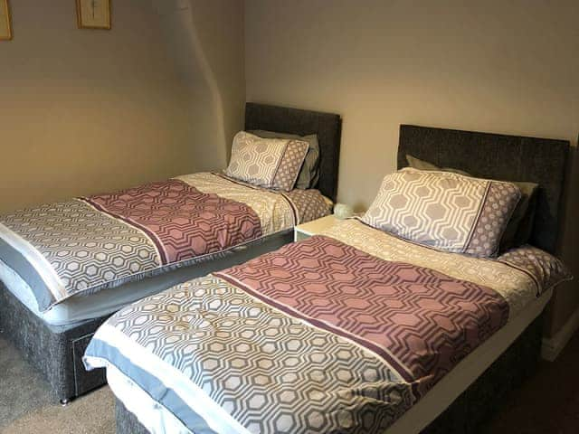 Pretty bedroom with twin single beds | Mill Stone Cottage, Wolsingham, near Stanhope