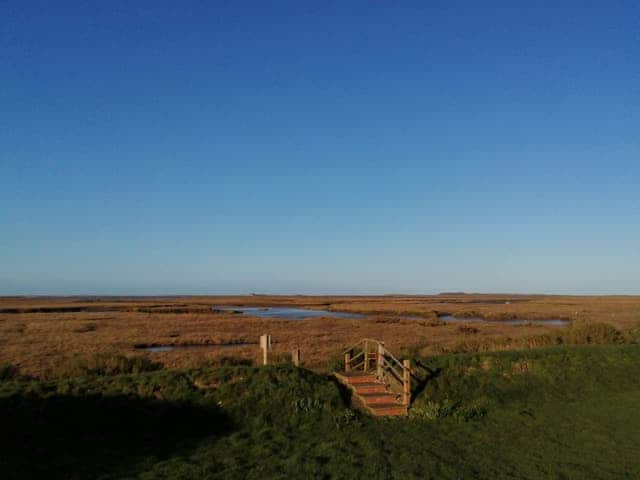 Beautiful salt marsh vista from the end of the garden | Dale View, Vista Cottage - Sea Marsh Cottages, Brancaster Staithe, near Wells-next-the-Sea