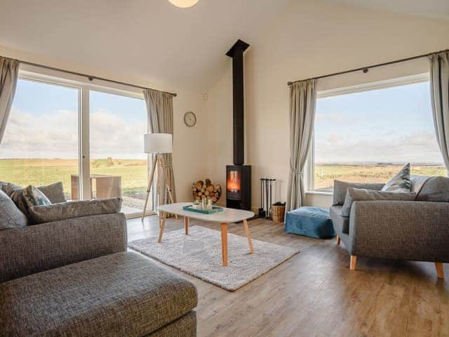 Lounge area with wood burner | The Gallops - Ilsley Farm Barns, East Ilsley, near Newbury