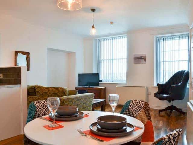 Dining area overlooking the living room | Duncan Square, Whitehaven